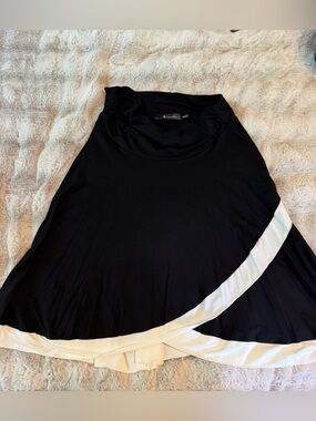 Meesha flared A-line black skirt with white flouncy trim